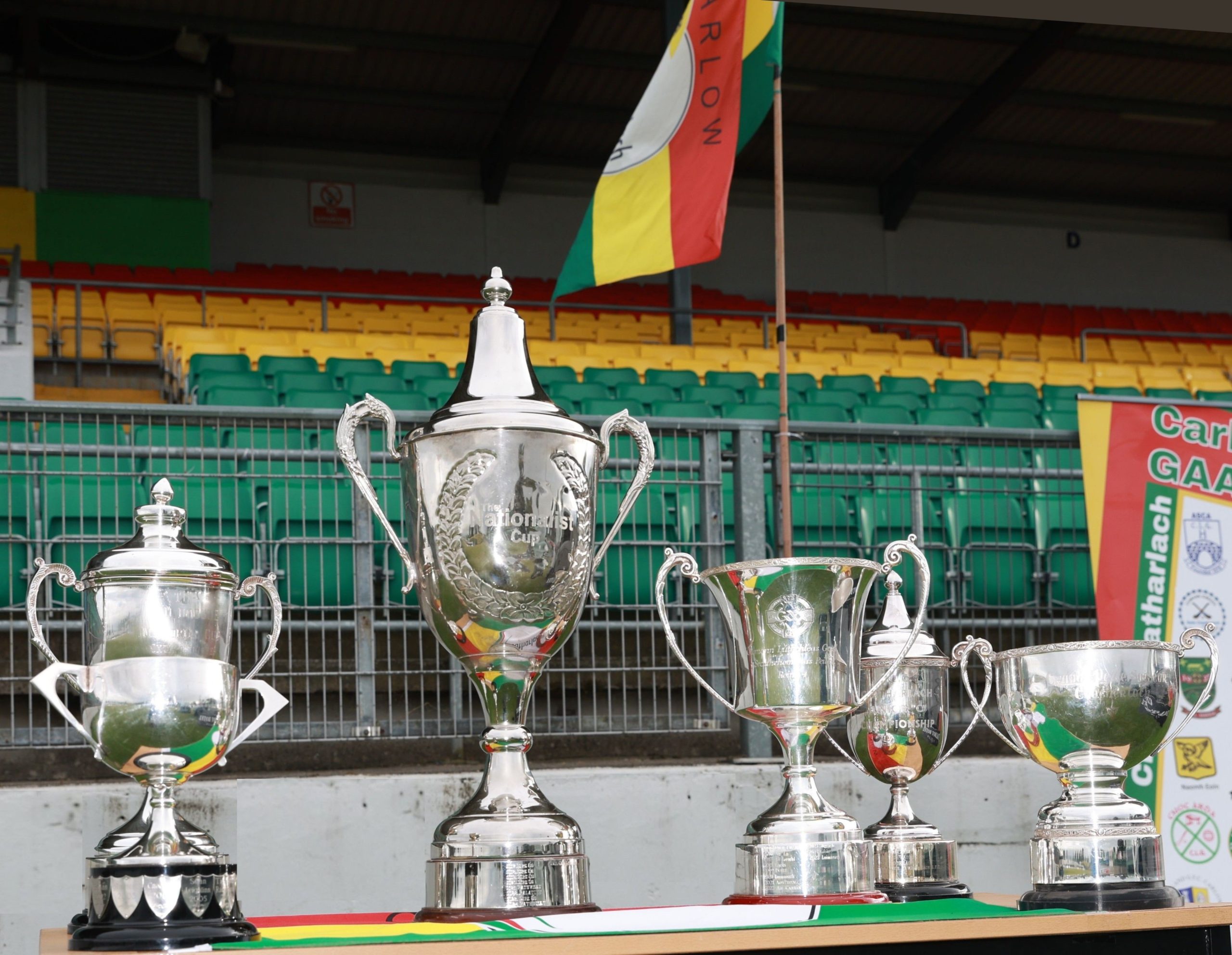 Football Trophies in front of stadium stands